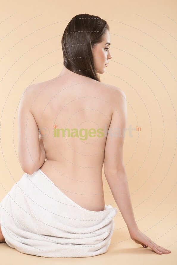 woman showing her bare back 