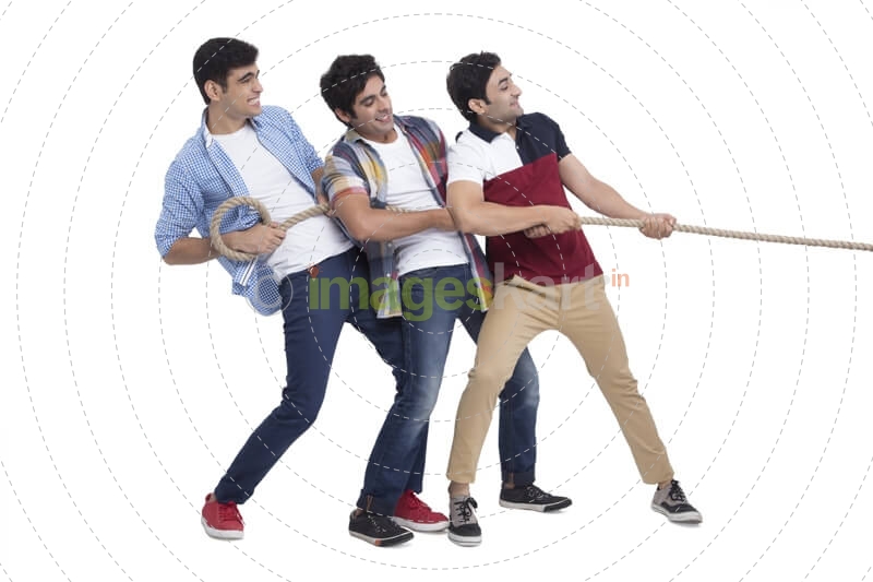 three friends pulling rope