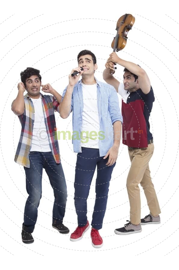 boys having fun while playing music