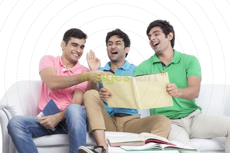 three friends laughing over joke