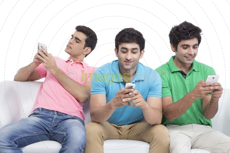 three friends messaging on mobile phone