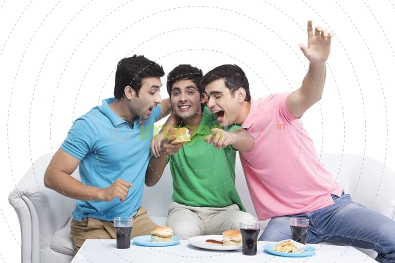 friends cheerful during cricket match
