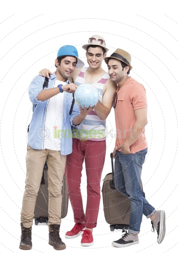 friends looking at globe map