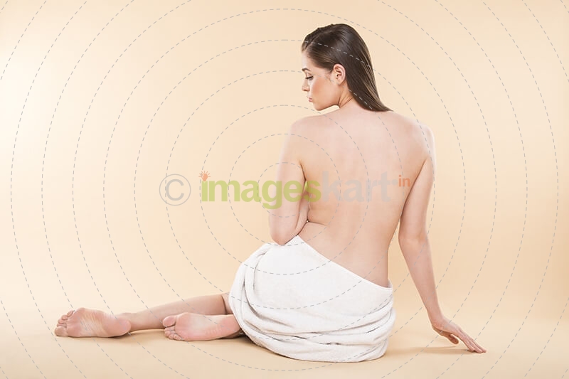 woman showing her bare back 