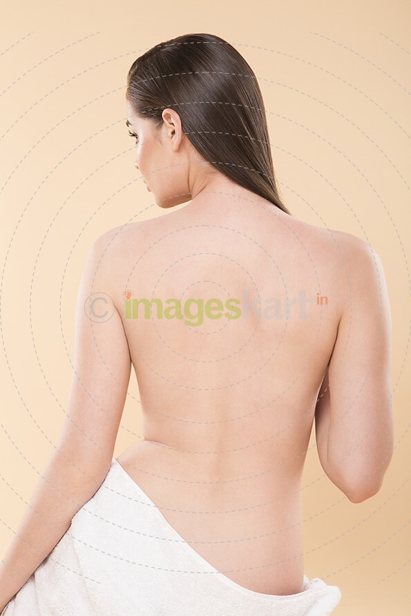 woman showing her bare back 