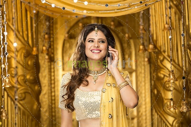 woman in traditional wear talking on phone