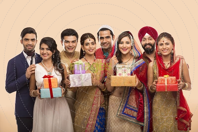 group of indian people posing with gifts