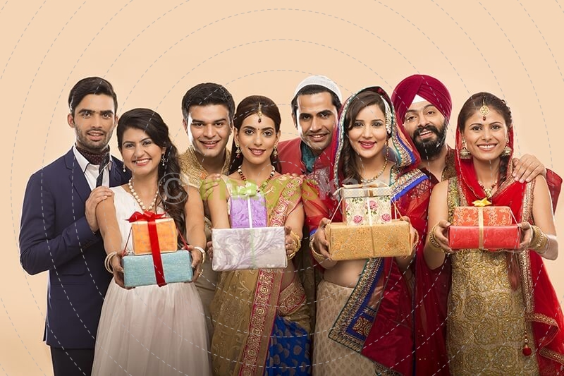 group of indian people posing with gifts