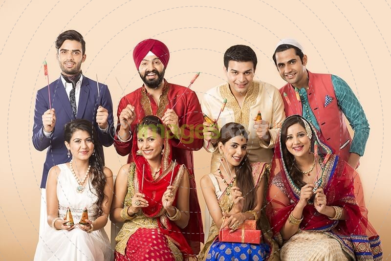 Indians posing with fire crackers 