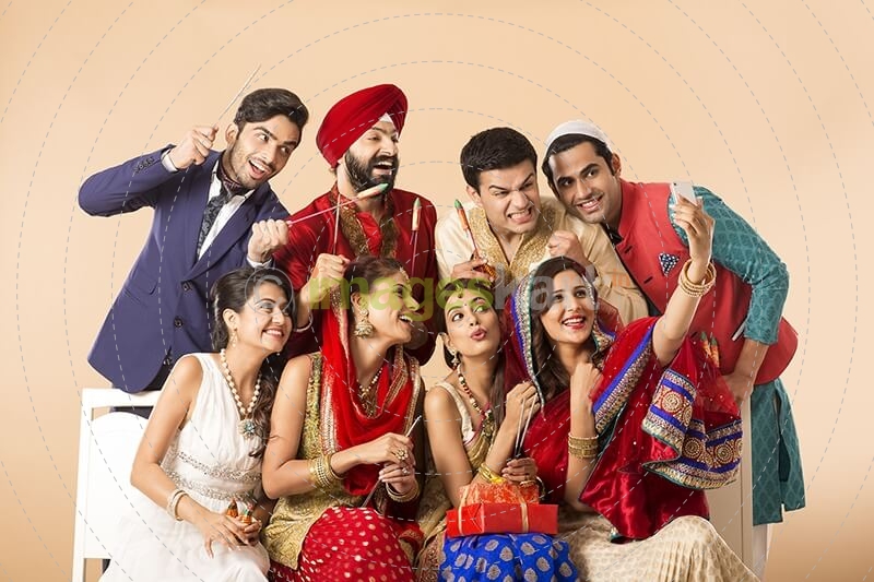 group of indian people taking picture during festive season