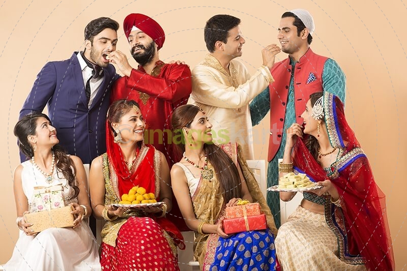 group of indian celebrating diwali festival