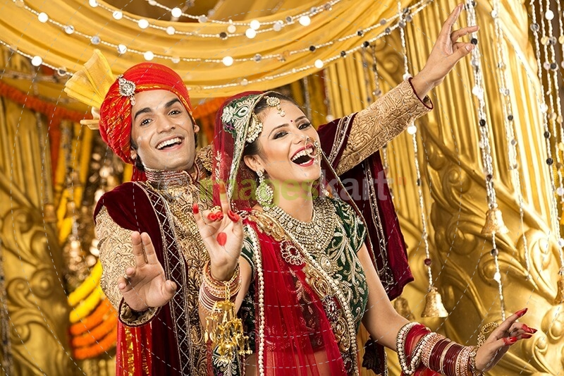 indian bride and groom dancing