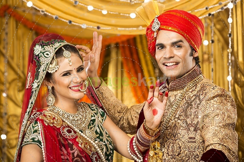 indian bride and groom dancing