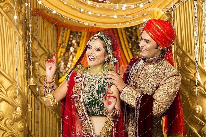 indian bride and groom dancing