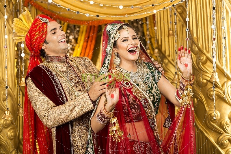 indian bride and groom dancing
