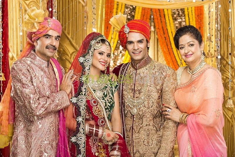 bride and groom with parents