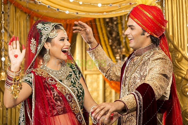 indian bride and groom dancing