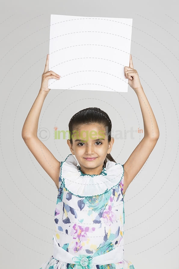 cute girl showing blank placard