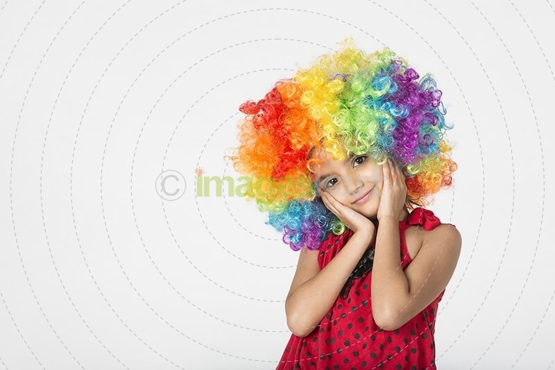 cute girl wearing colourful wig