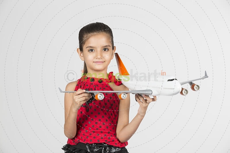 cute child playing with skateboard