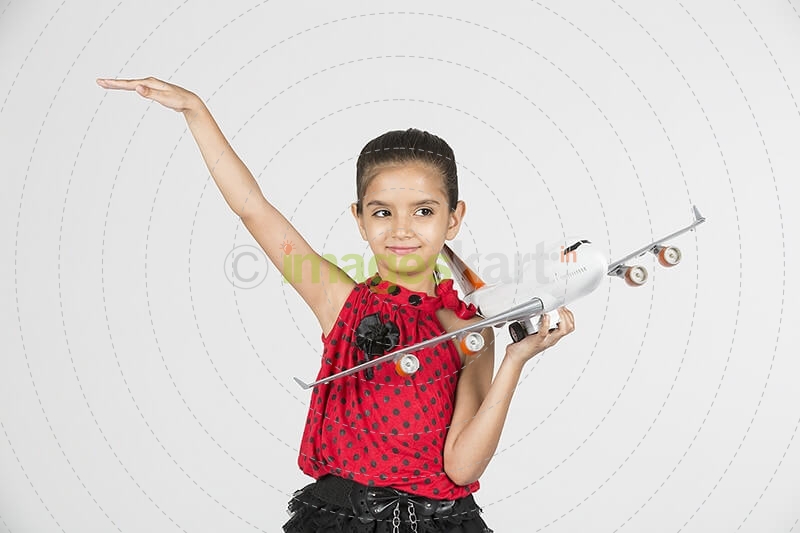 cute child playing with skateboard