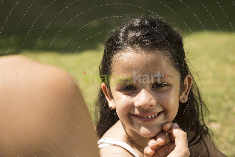 cute little girl smiling for the camera