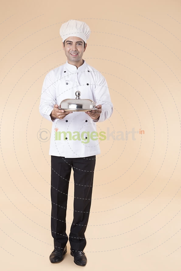 chef pointing towards something 