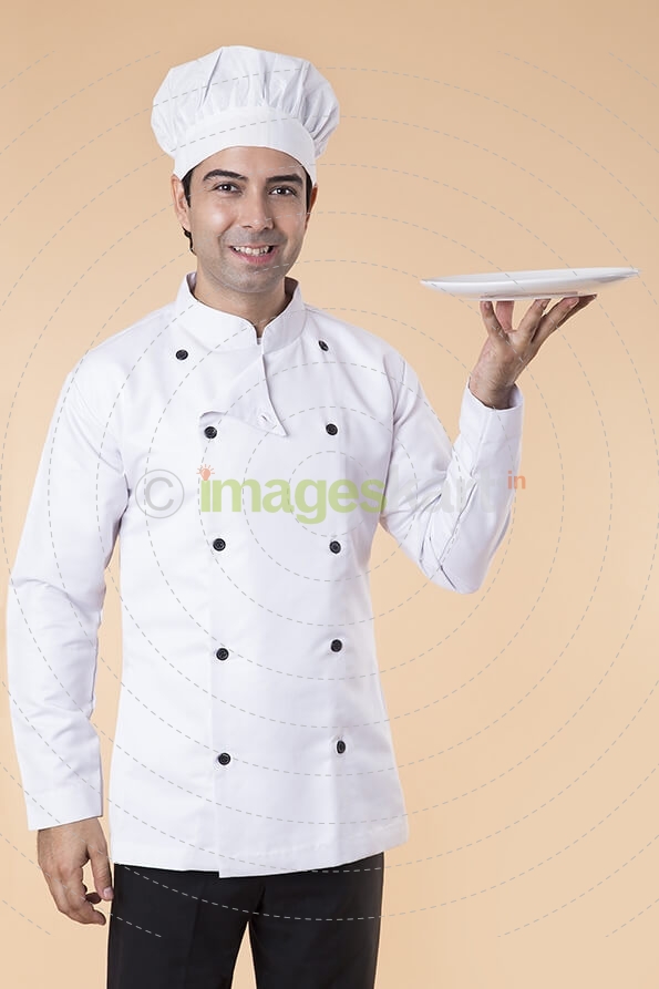 chef with serving plate 