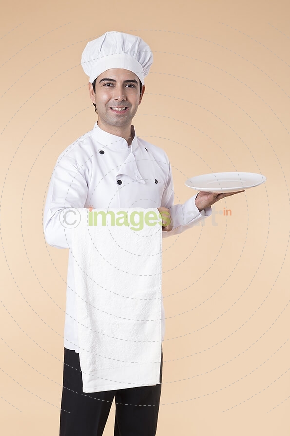 chef with serving plate 