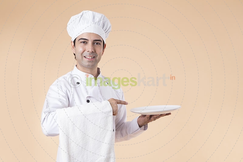chef with serving plate 