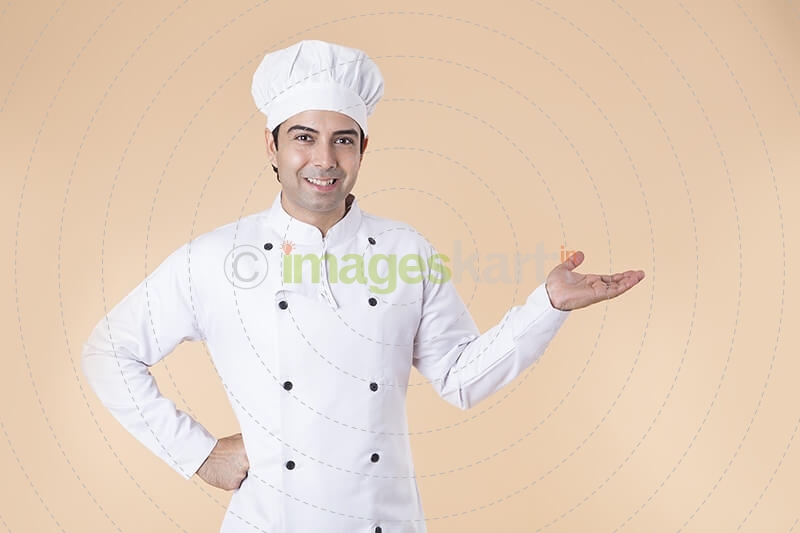 chef pointing towards something 
