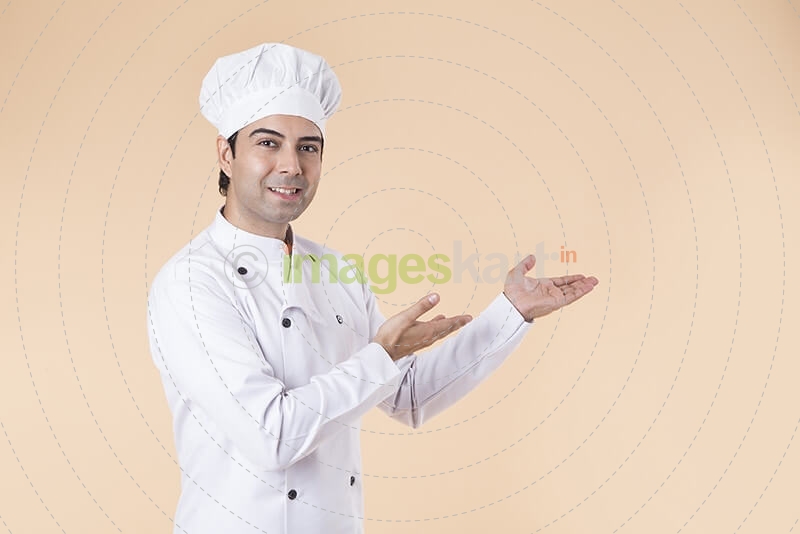 chef pointing towards something 