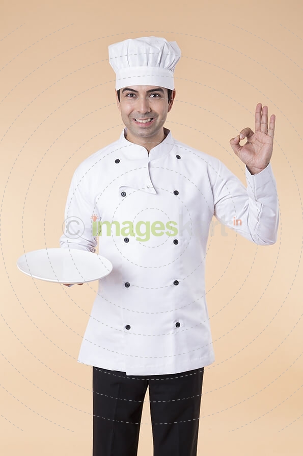 chef with serving plate 