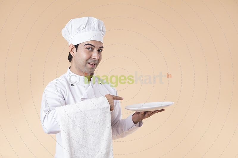 chef with serving plate 