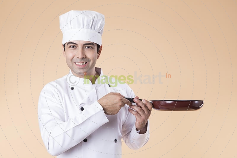 chef with frying pan
