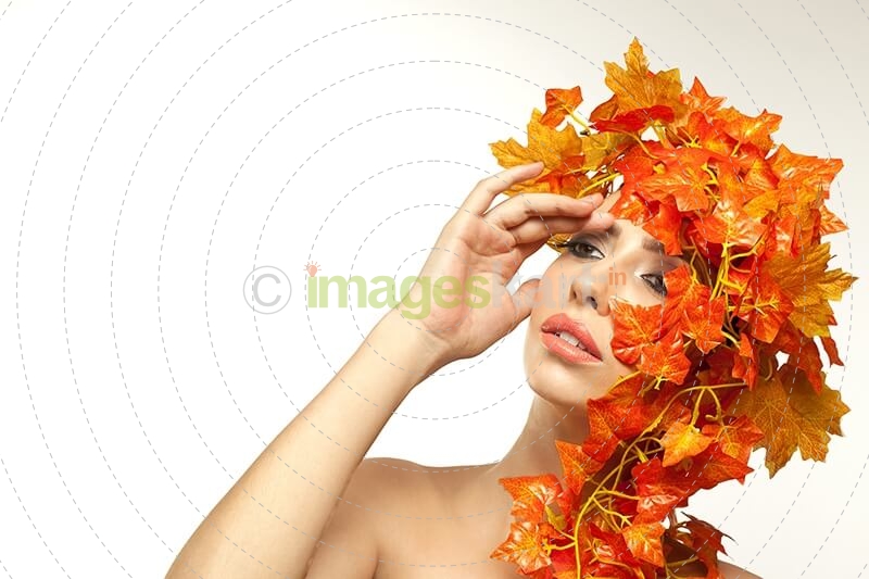 beautiful young woman portraying autumn