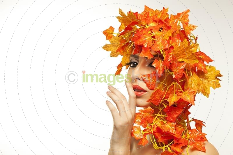 beautiful young woman portraying autumn