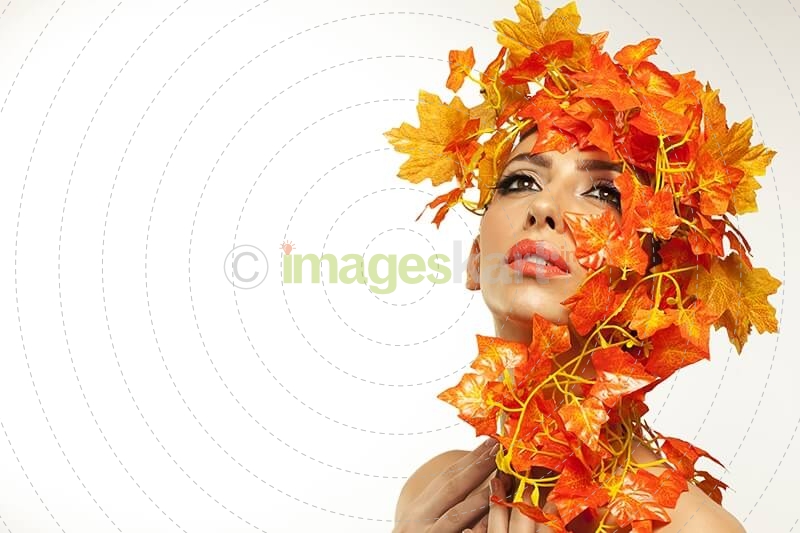 beautiful young woman portraying autumn