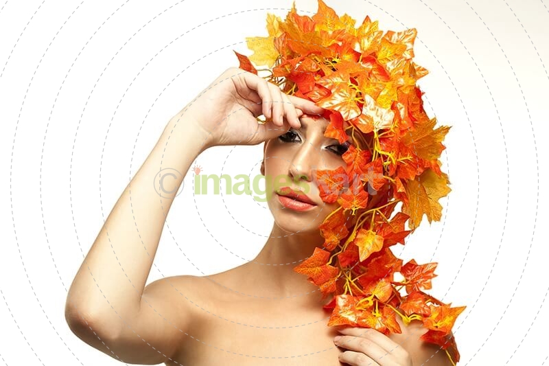 beautiful young woman portraying autumn
