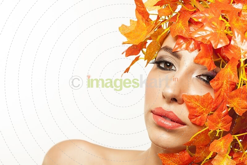beautiful young woman portraying autumn