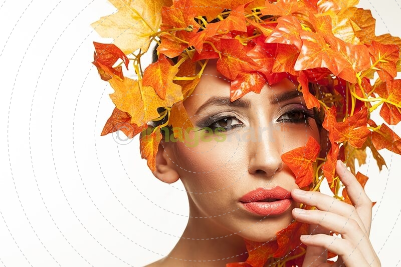 beautiful young woman portraying autumn