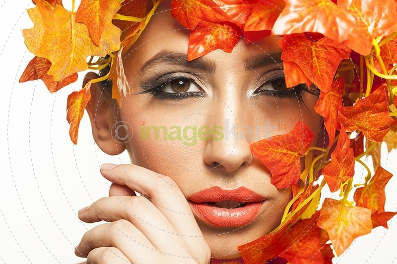 beautiful young woman portraying autumn