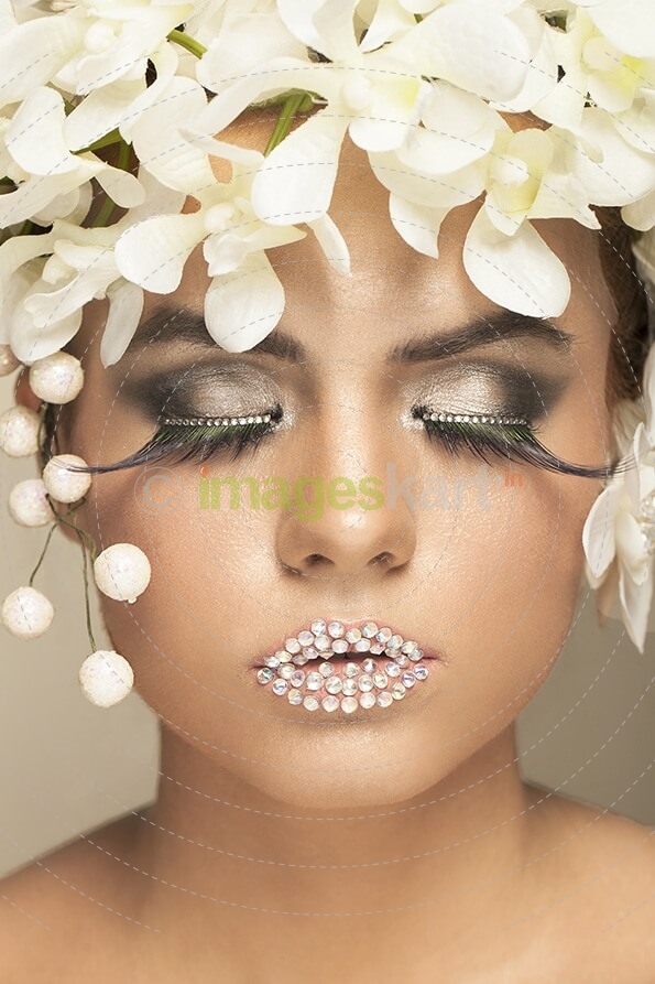 woman covered with white flowers
