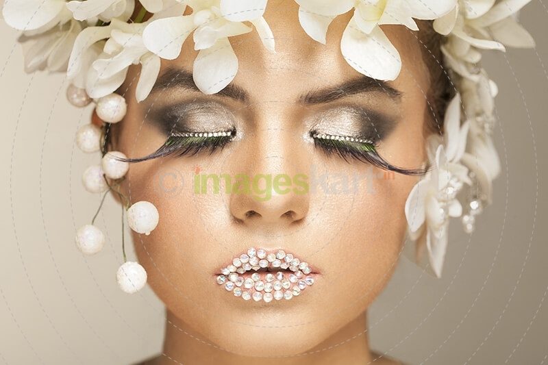 woman covered with white flowers