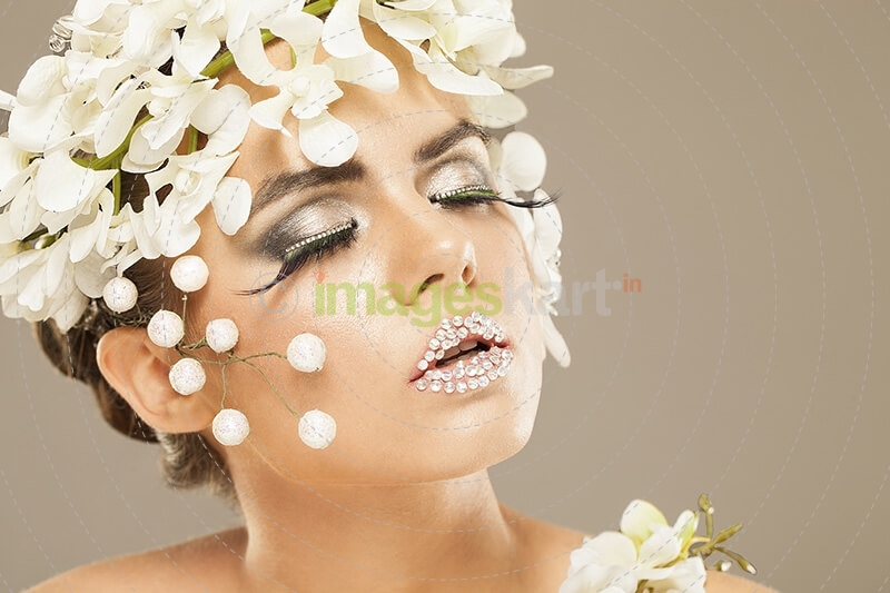 woman covered with white flowers