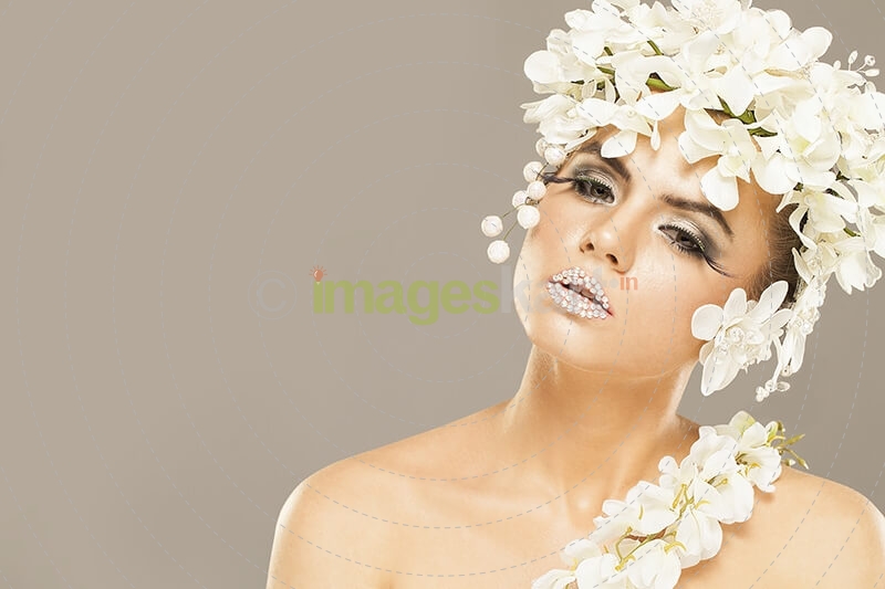 woman covered with white flowers