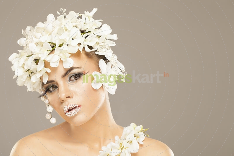 woman covered with white flowers