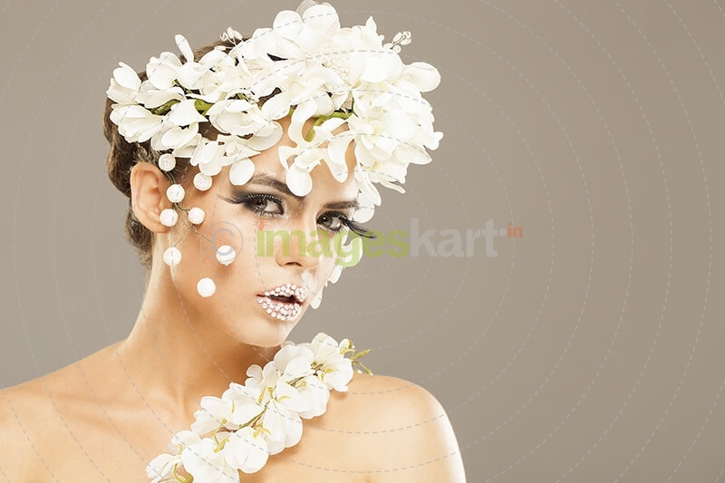 woman covered with white flowers