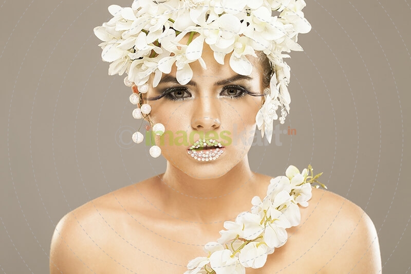woman covered with white flowers