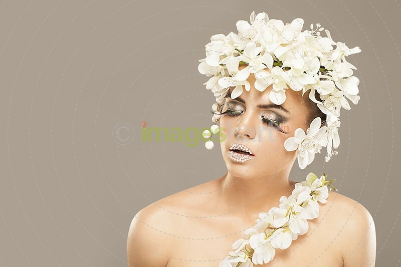 woman covered with white flowers